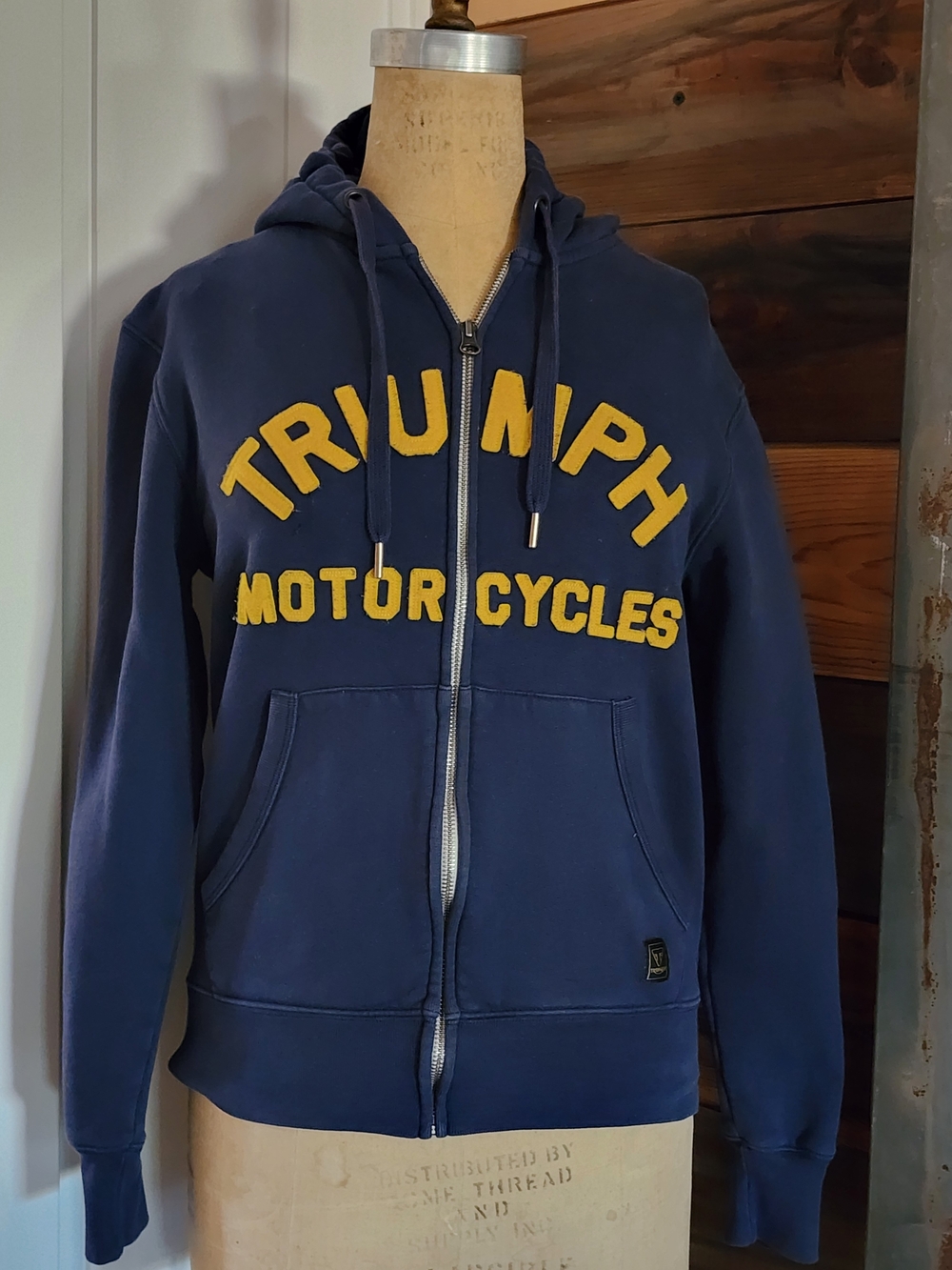 Triumph Navy Hoodie with Yellow Lettering 100% Cotton.